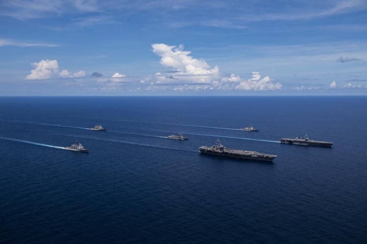 南海最新动态概览，海浪、椰树与航迹的交织